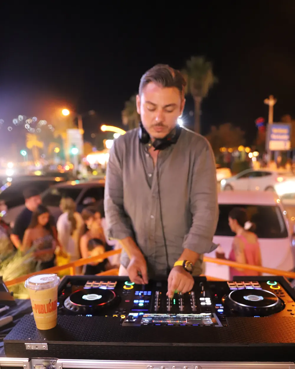 A DJ set on the seafront, a Public cup on the booth