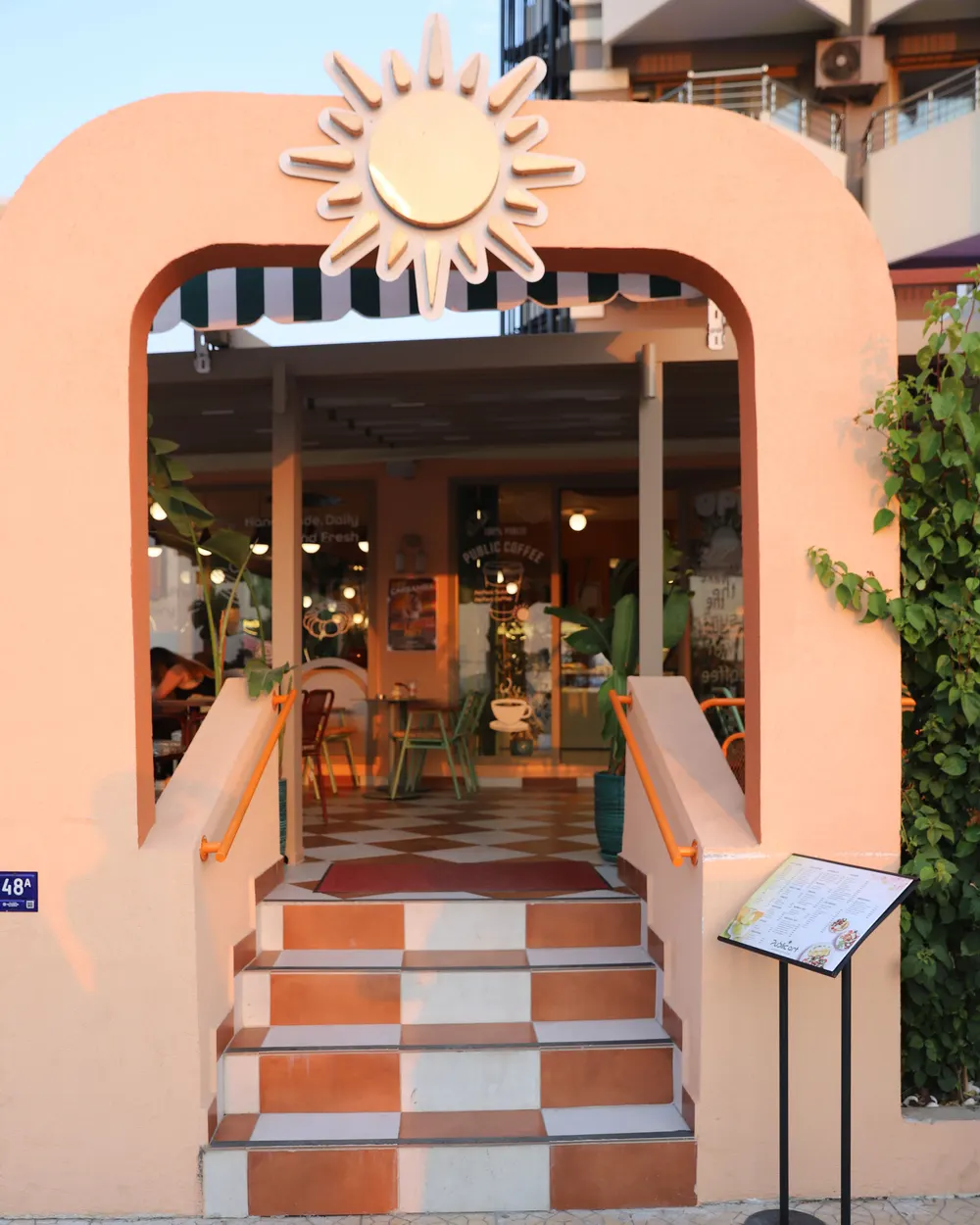 Inside Public Art Kuşadası: the art wall, neon sign and bar