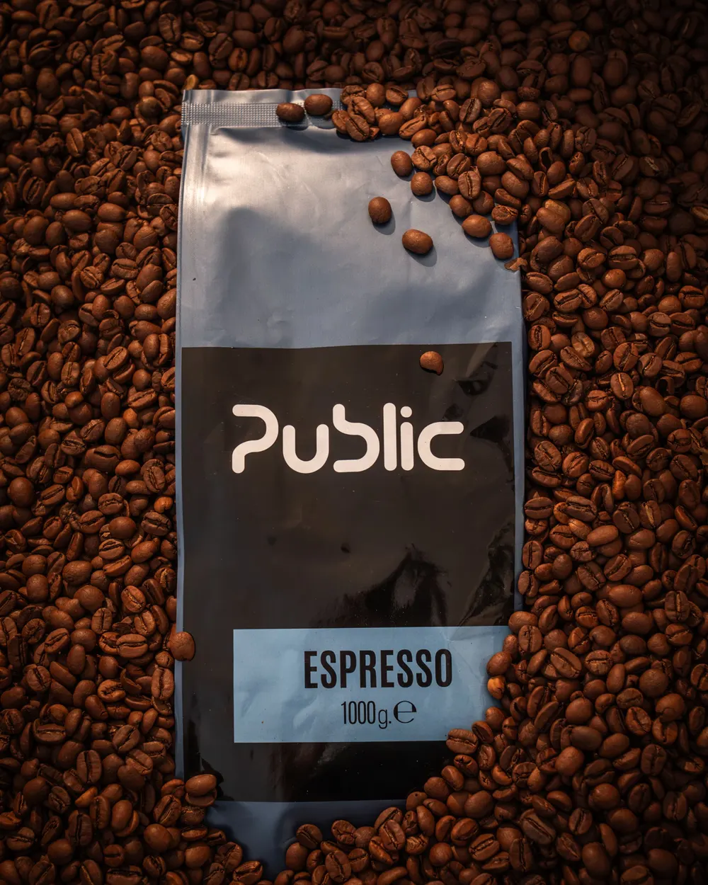 Public espresso bag among coffee beans
